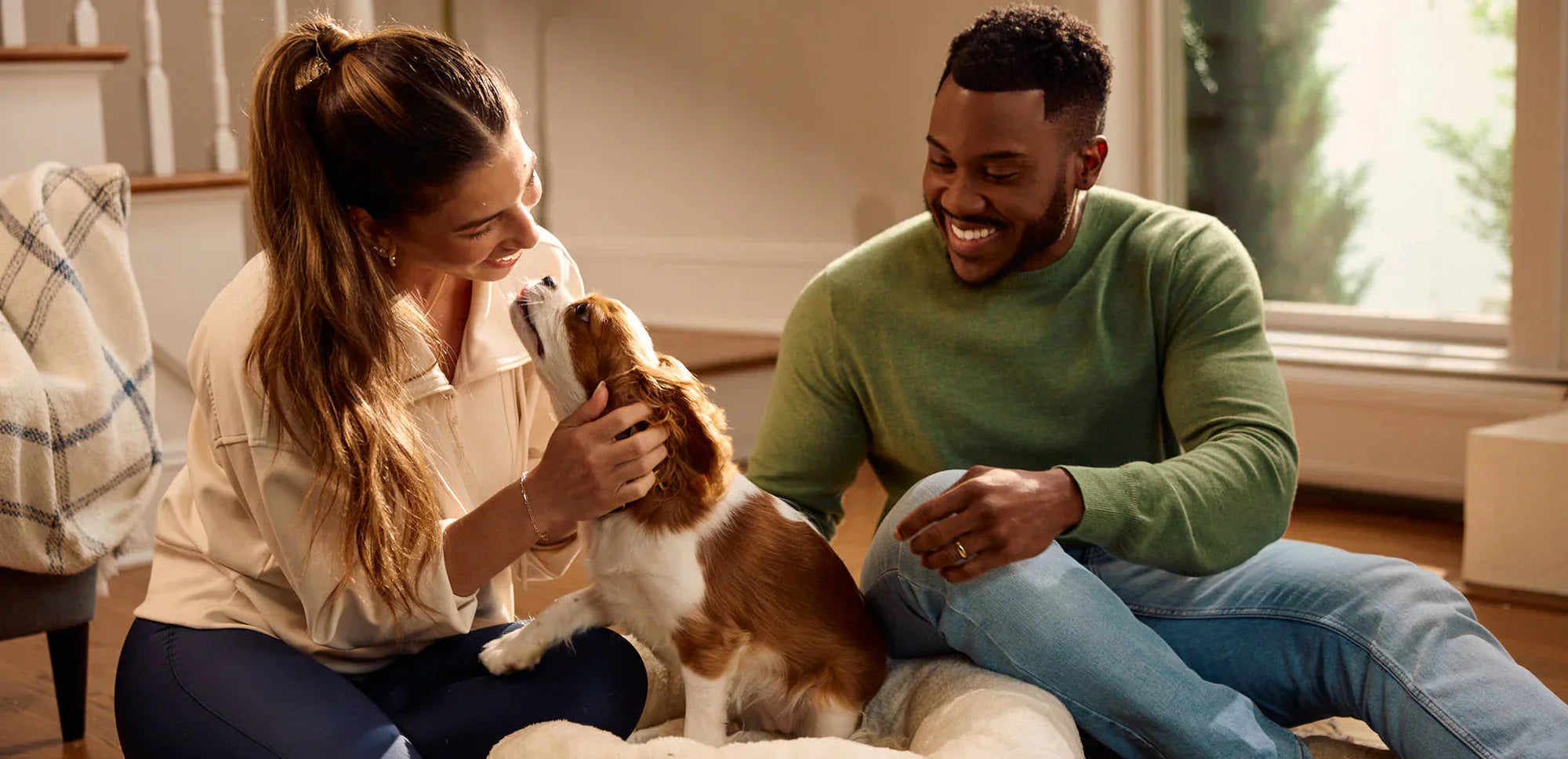 male and female petting dog