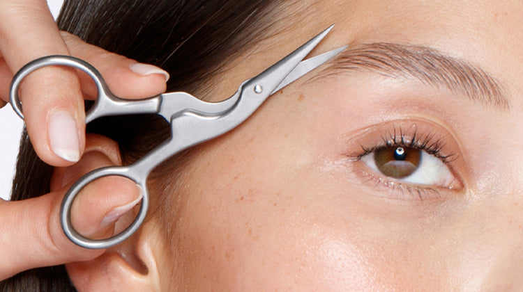 model using stainless steel brow scissors