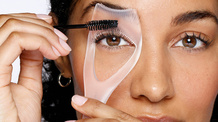 model using clear lash guard and comb