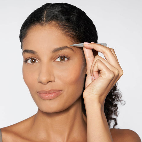 Model using Petite Point Tweezer