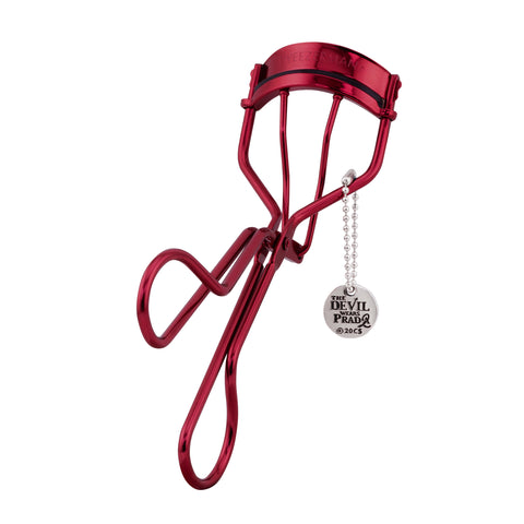 The Devil Wears Prada 2 Curler with silver charm on a white background