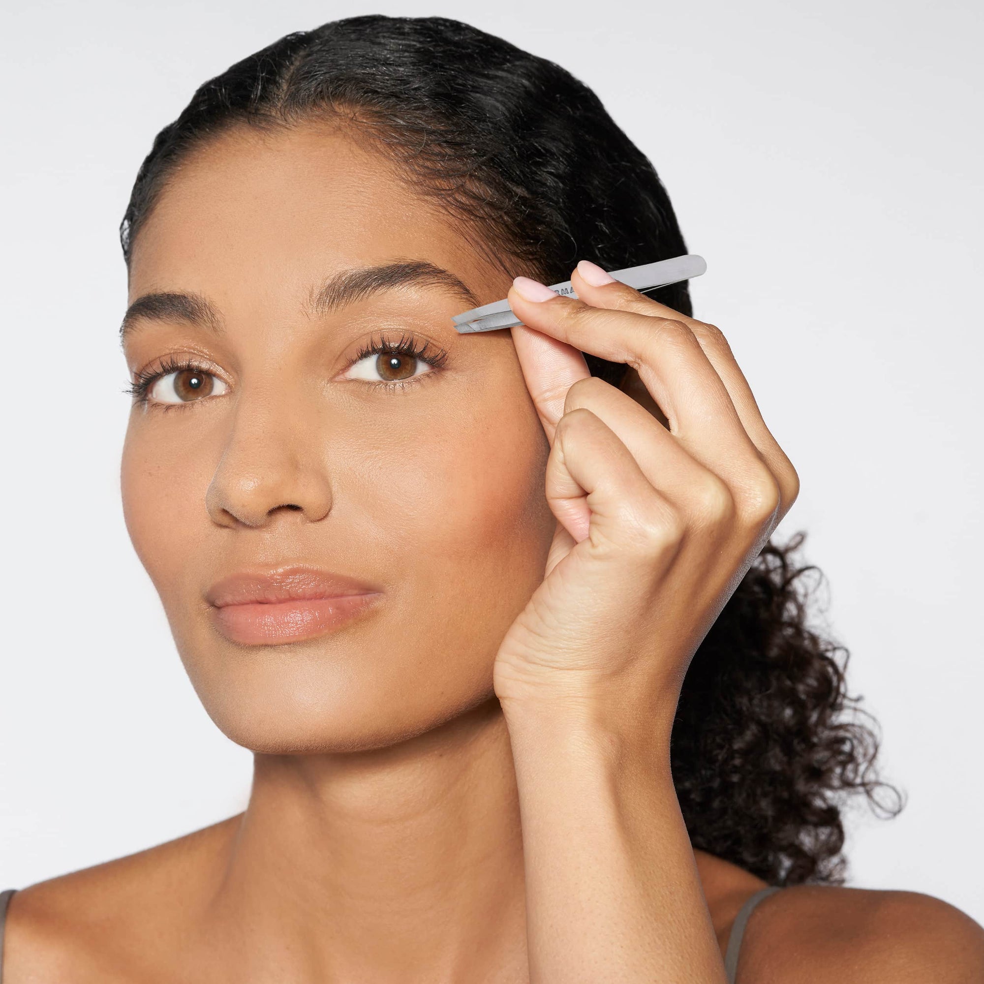 Model using Petite Slant Tweezer
