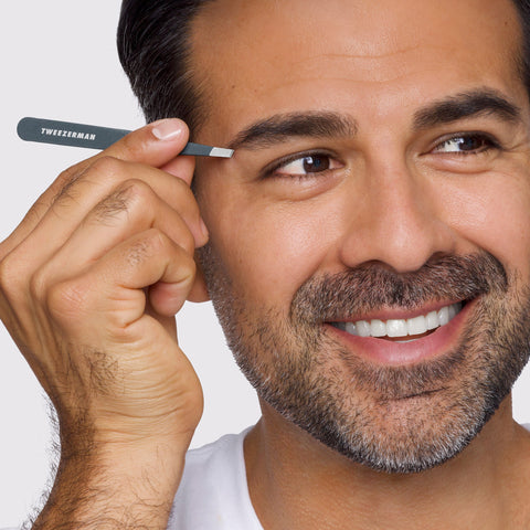Male Model using Blue Stone Slant Tweezer on brows