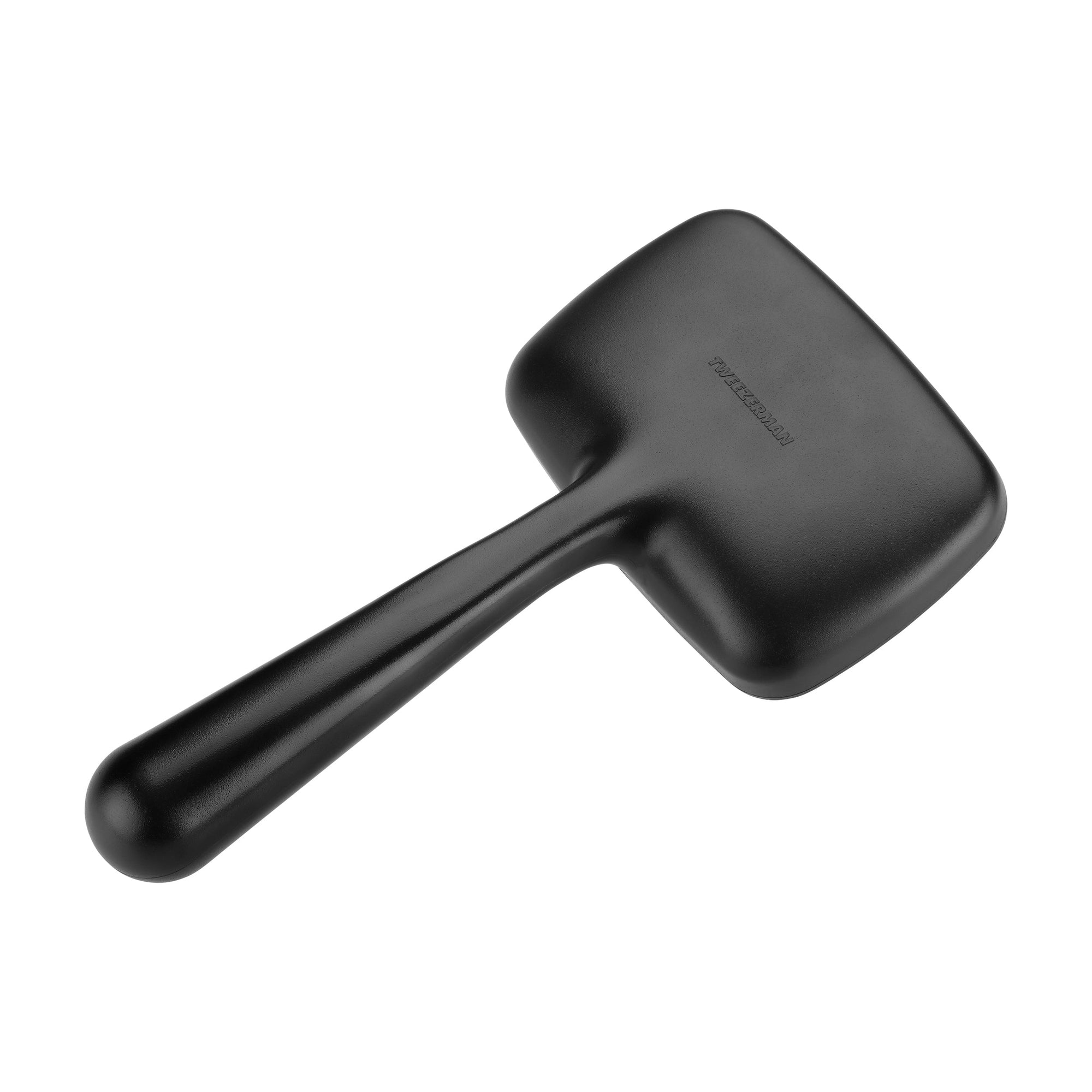 Revers du pinceau à grosse couche noire avec une finition lisse et plate.